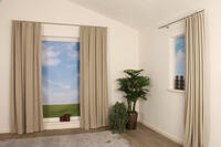 Met overgordijn Oppagne, die een subtiele bouclé effect heeft, creëer je een warme sfeer in huis