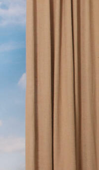 Met overgordijn Oppagne, die een subtiele bouclé effect heeft, creëer je een warme sfeer in huis