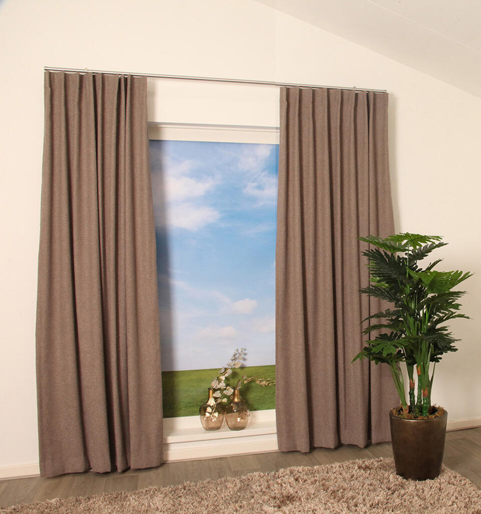 Met deze tijdloze en elegante bouclé gordijnstof is Ombret een trendy een veelzijdig overgordijn met een unieke textuur